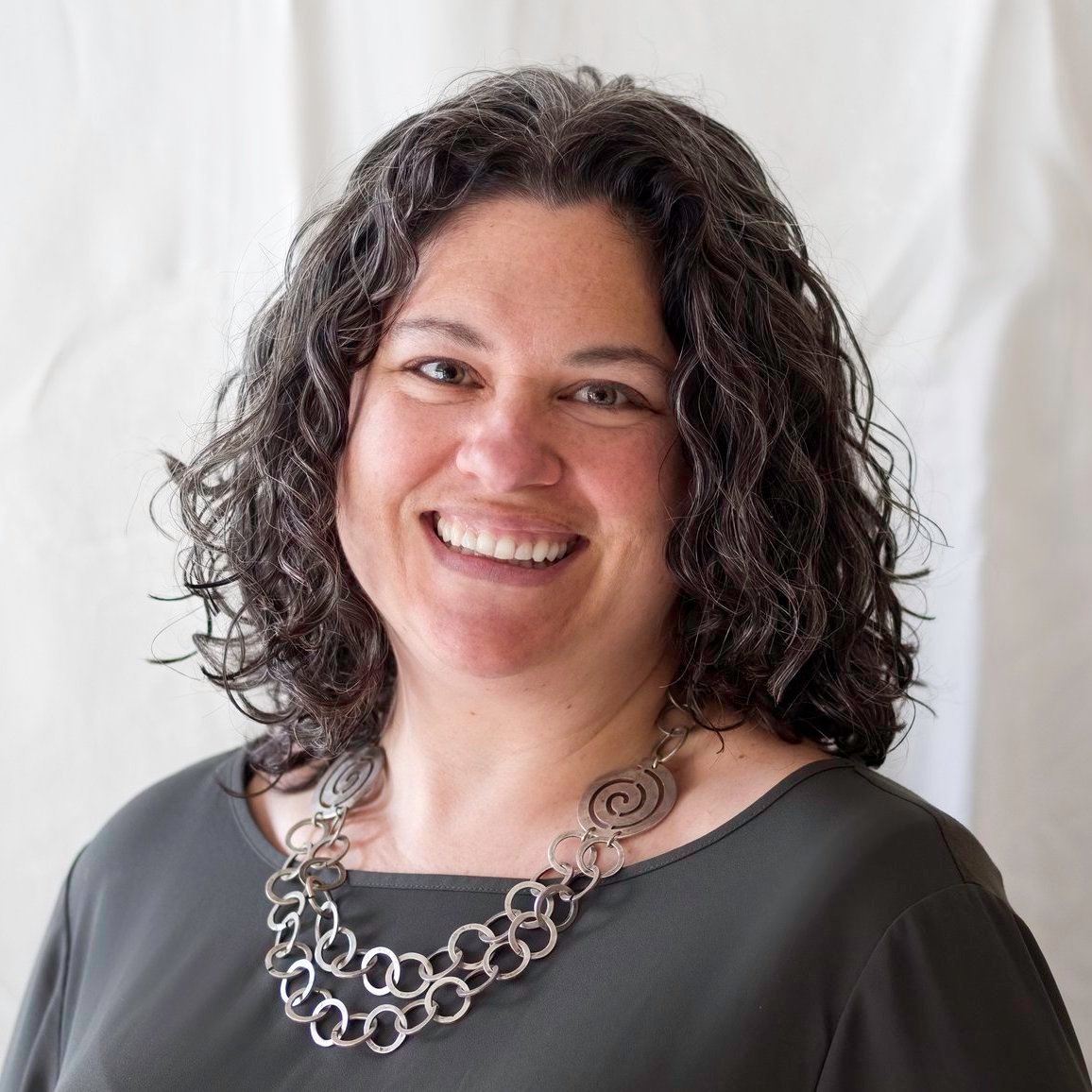 Ellie Headshot square Ellie Headshot square